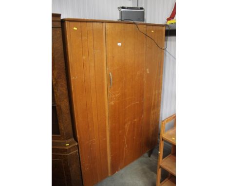 A Lebus single door wardrobe