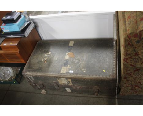 A metal bound travelling trunk