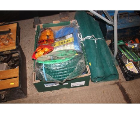 A box containing as new tarpaulins, tow rope and hose pipe; and a quantity of green mesh