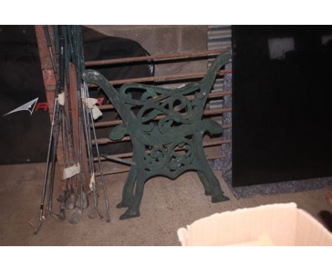 A pair of metal garden bench ends