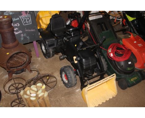 A child's pedal powered tractor and trailer