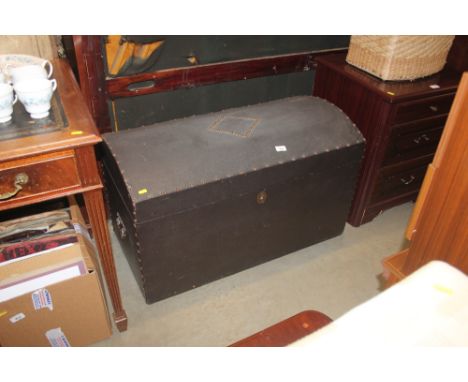 A domed top stud work trunk