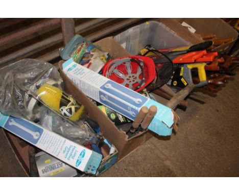 Three boxes of various hand tools, saws etc.