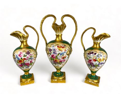 A mid 19th century English porcelain floral decorated green ground garniture attributed to H&amp;R Daniel
Comprising a vase a