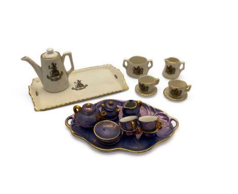 A collection of doll's house miniature porcelain
Comprising a purple lustre and parcel gilt tea set, consisting of a oval twi