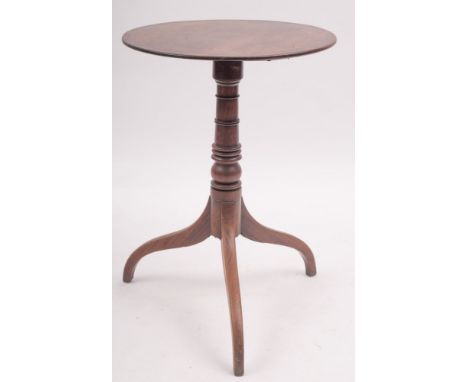 A Regency mahogany circular tripod table, early 19th century; with turned stem, 72cm high, 57cm diameter