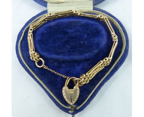 A Victorian 9ct rose gold "night and day" gate link bracelet, the heart shape padlock stamped 9c, CBD, weight 16.5 gms, case.