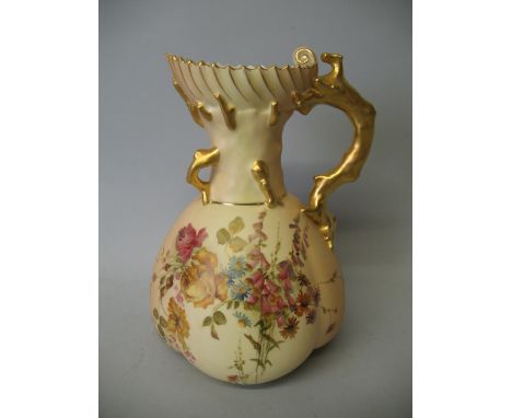 A late Victorian Royal Worcester jug, of quatrefoil bulbous form with shell shaped rim and gilded branch handle, the blush gr