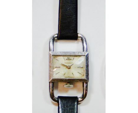 Jaeger LeCoultre - a ladies stainless steel manual wind "Saddle" wristwatch, c. 1960's, model 1670, the silvered dial signed 