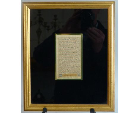 A Persian manuscript page from The Koran, probably late 17th century, written in red, black, gilt and blue, see typed label o