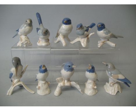 A collection of ten Goebel figures of birds, each painted in pastel colours of blue, grey and pink, average height 7cm (10)