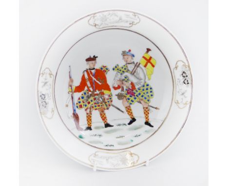 A Chinese plate, of dished circular form the centre enamelled with two members of the highland regiment, one holding a gun, t