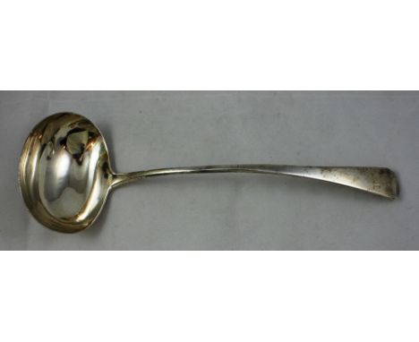 A George III silver Old English pattern soup ladle, makers mark worn, London 1812, crested, weight 5.5 oz.