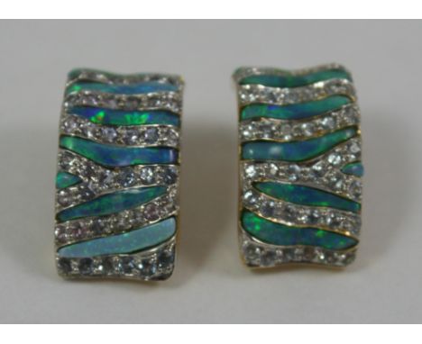 A pair of 18 k gold, opal doublet and aquamarine ear clips, of linear design, weight 13 grams.