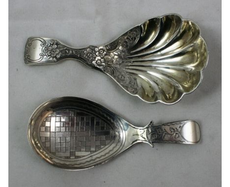 A Victorian silver fiddle pattern caddy spoon, by Elizabeth Eaton, London 1846, with shell bowl and floral chased handle, and