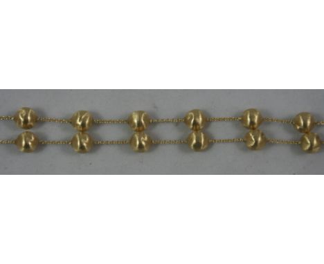 Marco Bicego - an Italian 18ct gold "Africa Collection" bead necklace, composed of textured beads with chain link between, le