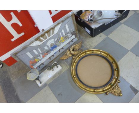 A cast alloy depicting The Last Supper, a lamp and gilt mirror frame