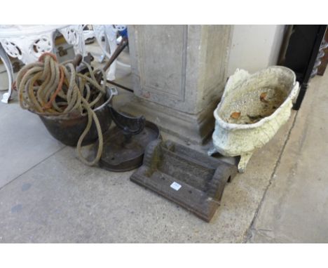 A Victorian cast iron planter, boot scraper, hooks, etc.