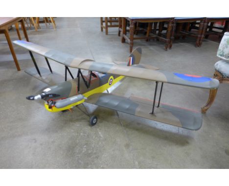 A remote control model bi-plane, lacking control