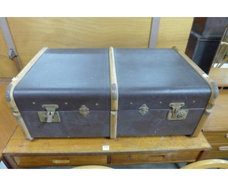 A banded travel trunk