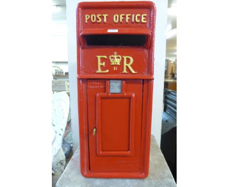 A red Post Office letter box