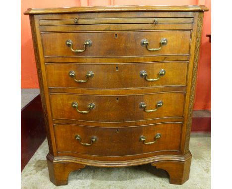 An Edward VII Chippendale mahogany bachelors chest of drawers