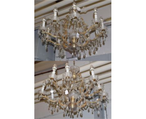 ^ A pair of Venetian style lustre drop ten-light chandeliers 