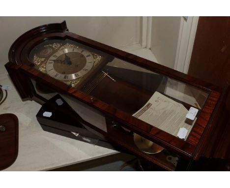 A silver plated Kings pattern table service in wood canteen; together with a modern chiming wall clock, signed Comitti, Londo