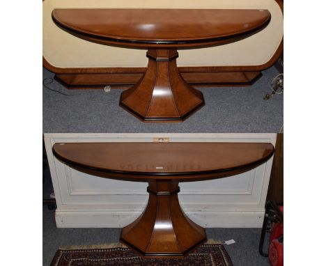 A pair of 20th century Italian design part ebonised walnut console tables, signed Oak Italia, of elongated demi-lune form, on