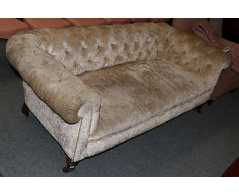 A mahogany framed Chesterfield style sofa on turned legs, 190cm wide
