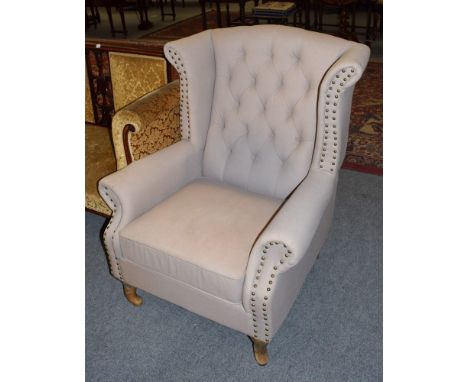 ^ A pair of John Sankey button back upholstered armchairs