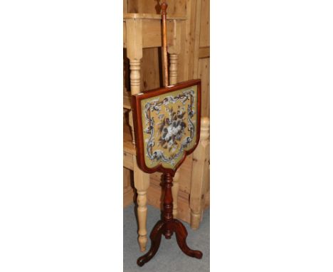A Victorian pole screen with embroidered bead work panel 
