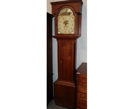 An oak thirty hour longcase clock, arch painted dial signed Chris Dixon, Hexham