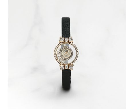 Chopard. Montre bracelet de dame en or jaune 18K (750) sertie de diamants mouvement quartzChopard. A lady's 18K gold and diam