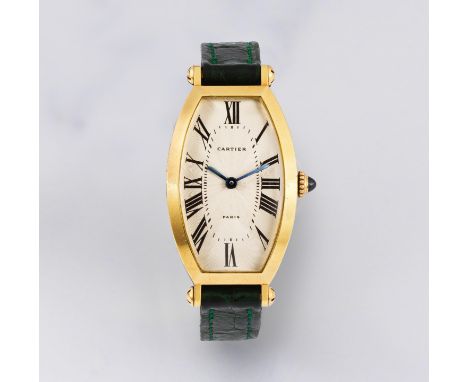 Cartier. Montre bracelet de dame en or jaune 18K (750) de forme tonneau mouvement mécaniqueCartier. A lady's 18K gold manual 