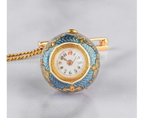 Montre pendentif en forme de boule en or jaune 18K (750) et émail et sa chaîne remontoir dissimuléA lady's 18K gold and ename