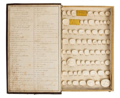 *Grand Tour. A 19th-century book-form box, containing 138 classical plaster seals,  Impronte Gemmarie 10, Dalla Collez, Cades