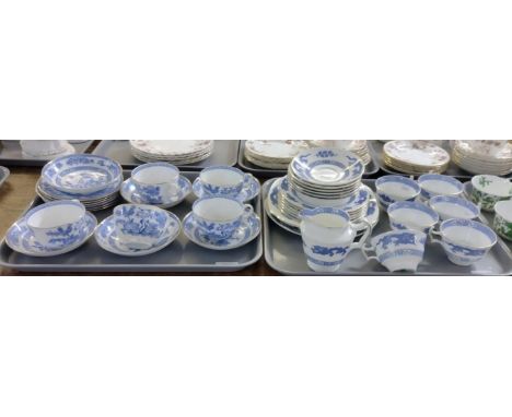 Two trays of blue and white china teaware to include: Orchid design teacups and saucers and small plates with gilt rims and C