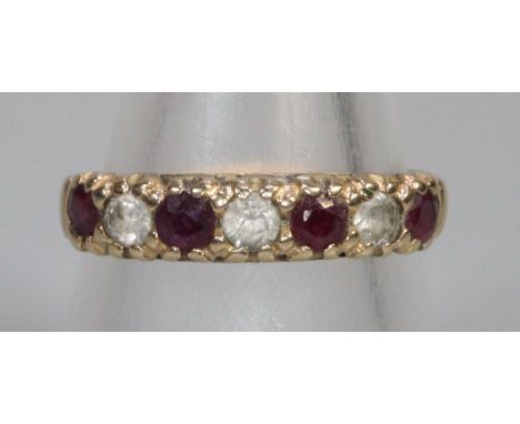 9ct gold ruby and white stone ring.  Size Q.  2g approx.  (B.P. 21% + VAT) 