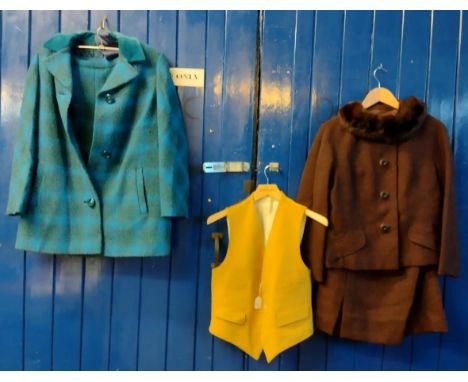 Two ladies 1960's-70's woollen skirt suits, one with a fur collar with a 'Bro Phil Model' label in a dark brown and a blue an