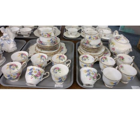 Two trays of Royal Albert English bone china 'Harvest Bouquet' design teaware to include: teapot, teacups and saucers, milk j