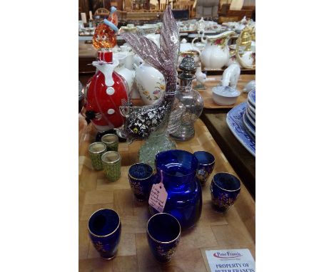 Tray of glassware: small spirit decanter, florally decorated, together with four shot glasses, small vintage blue glass Kastr