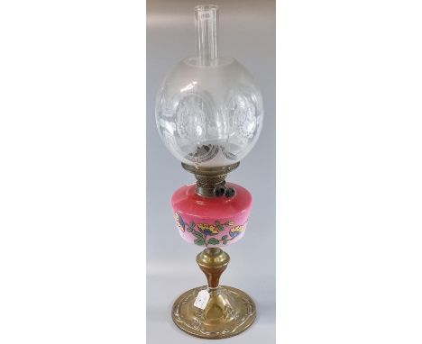 Early 20th century double oil burner lamp having frosted and clear glass globular etched foliate shade above an opaline glass