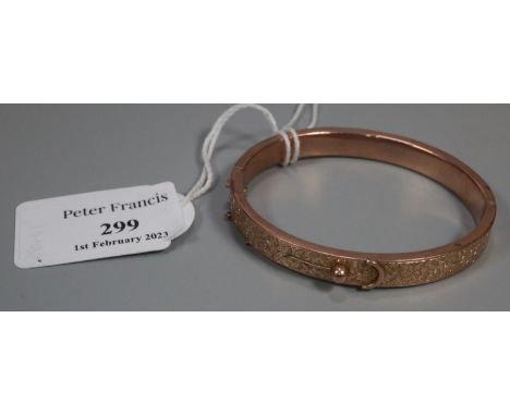 9ct gold bangle in fitted case, engraved and chased decoration. 10.4g approx. (B.P. 21% + VAT)Condition is good.  Scratches a