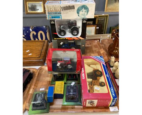 Two trays of boxed diecast model tractors, to include: Universal Hobbies, A Traktor Svalnikem, Ertl etc.  (2)   (B.P. 21% + V