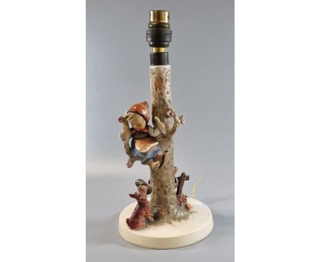 Hummel West German table lamp base in the form of a young girl sitting on a tree with terrier dog. (B.P. 21% + VAT)The plug h