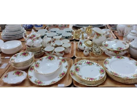 Four trays of Royal Albert English fine bone china 'Old Country Roses' design items to include: various plates, serving dishe