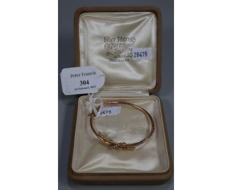 Yellow metal seed pearl bangle.  4.6g approx.  (B.P. 21% + VAT) 