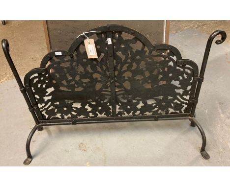 Metal pierced firescreen standing on stylised turned supports. (B.P. 21% + VAT) 