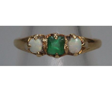 18ct gold opal and green stone ring.  Ring size Q.  (B.P. 21% + VAT) 